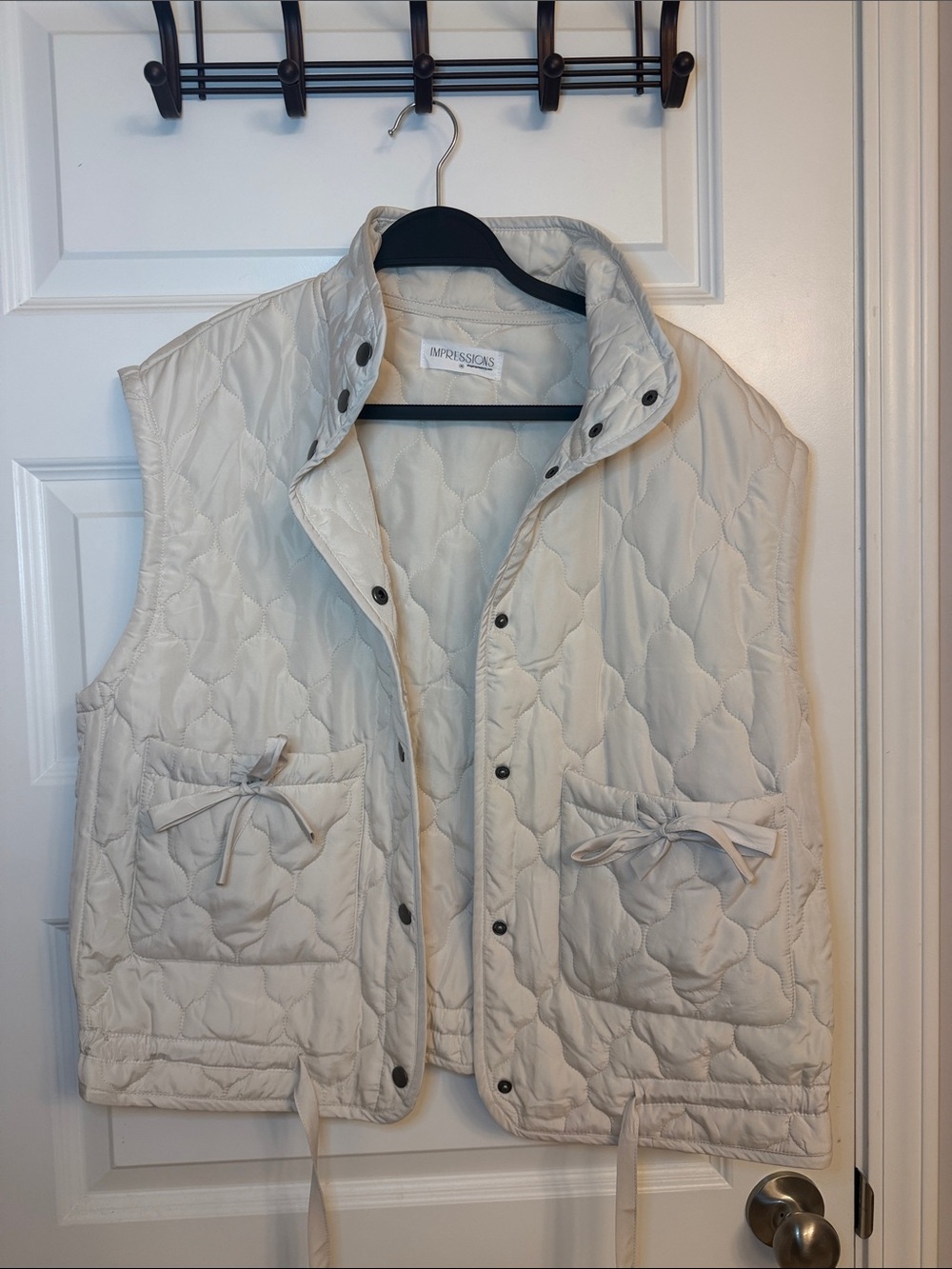 Impressions Quilted Cream Sleeveless Vest with Tie-Pocket Detail